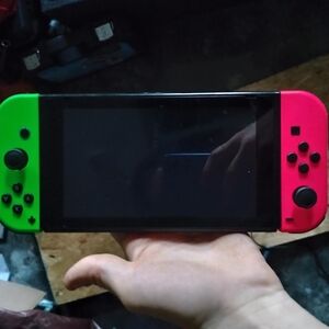 Nintendo Switch Console with Neon Red and Neon Green Joy-Con